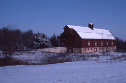 The Henry Sump barn was photographed several times by Charles Herman. Sump had this barn built on his Alma farm in 1913. This winter view dates from the 1970s.