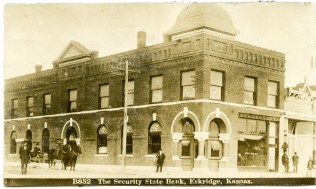 This real photo postcard showing the Security State Bank in Eskridge, Kansas dates from about 1907.